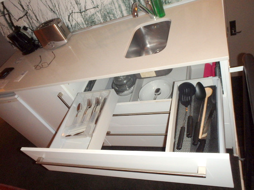This Drawer is Interesting because it wraps around the sink.